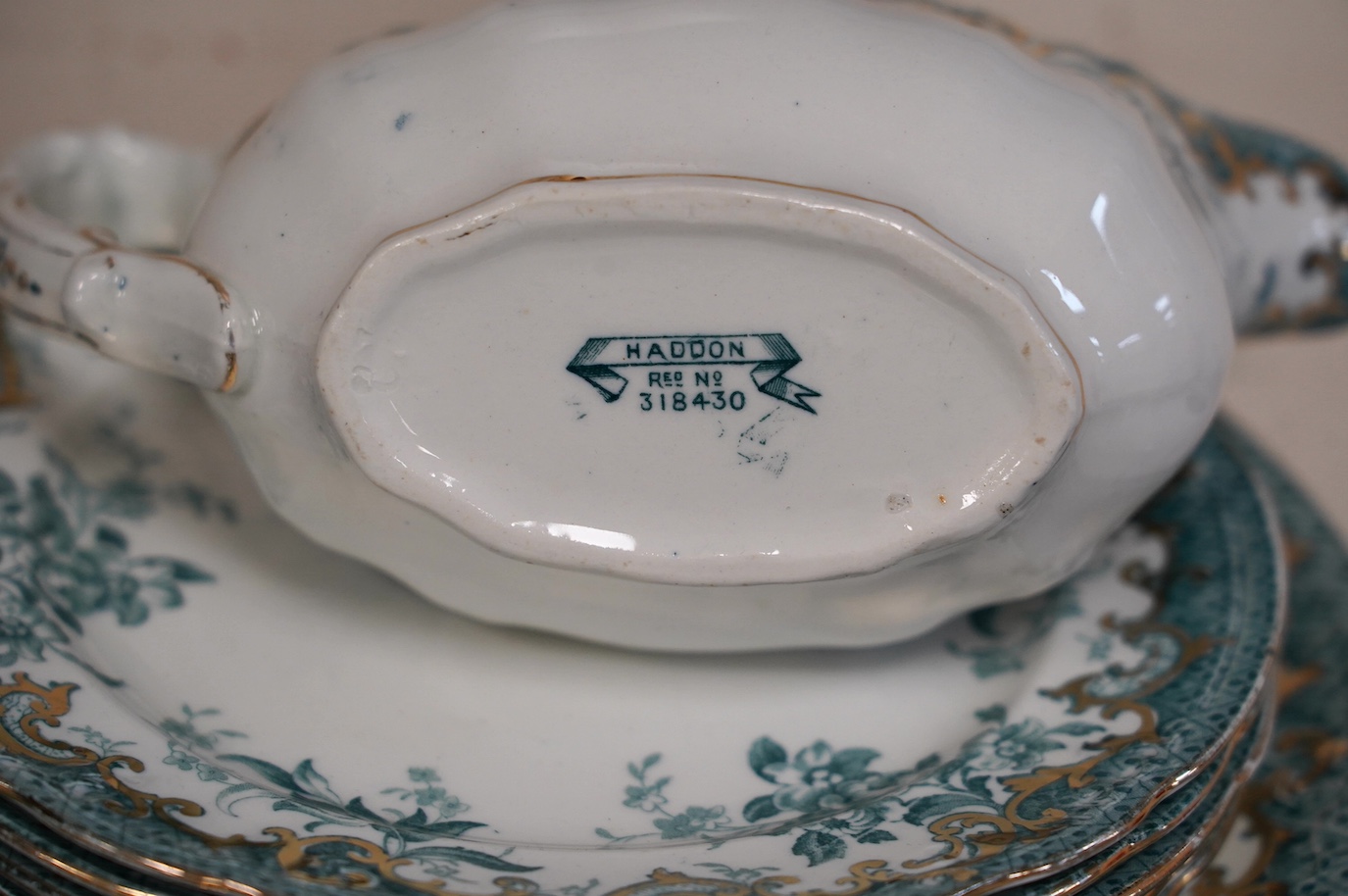 A Staffordshire pottery ‘’Haddon’’ pattern part dinner service. Condition - fair to good